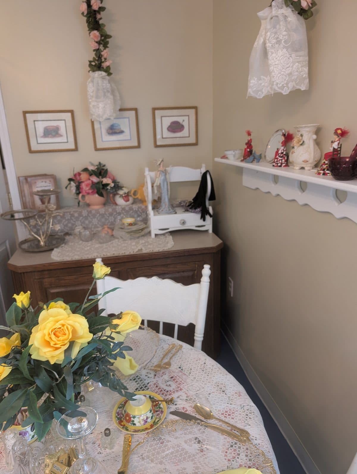 Yellow roses on the lace covered table